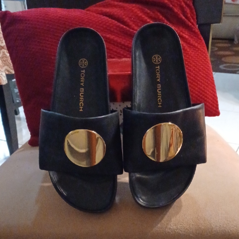 Tory Burch Black and Gold Sandals with Metallic Disc